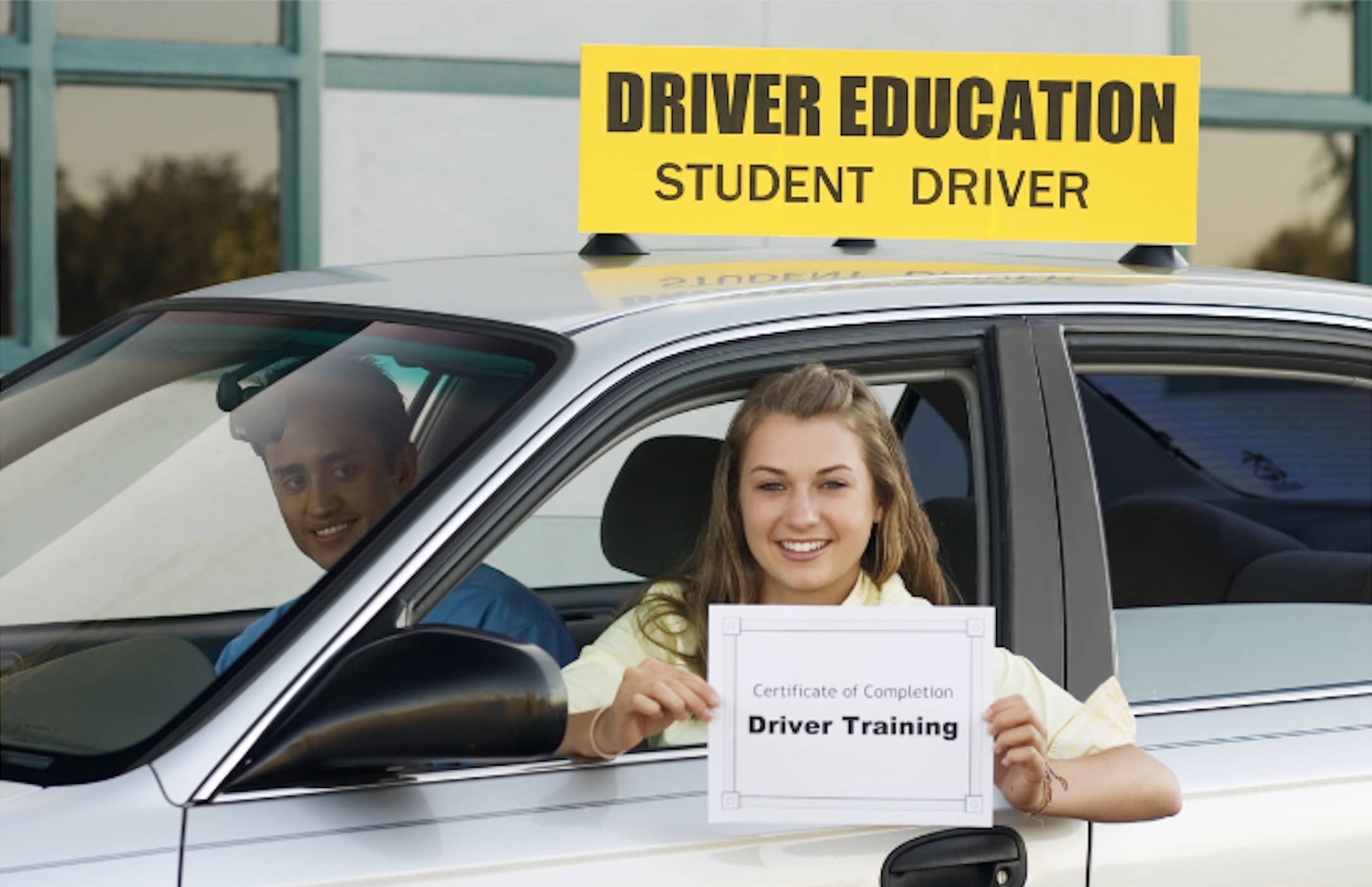 student driver showing course completion certificate